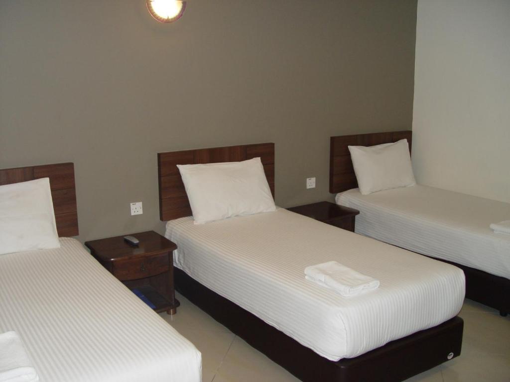 Jb City Hotel Johor Bahru Zimmer foto